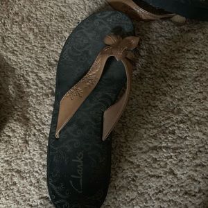 Clark’s flip flops